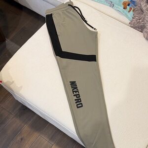 Nike Pro Men's Joggers in Tan with Black Accents